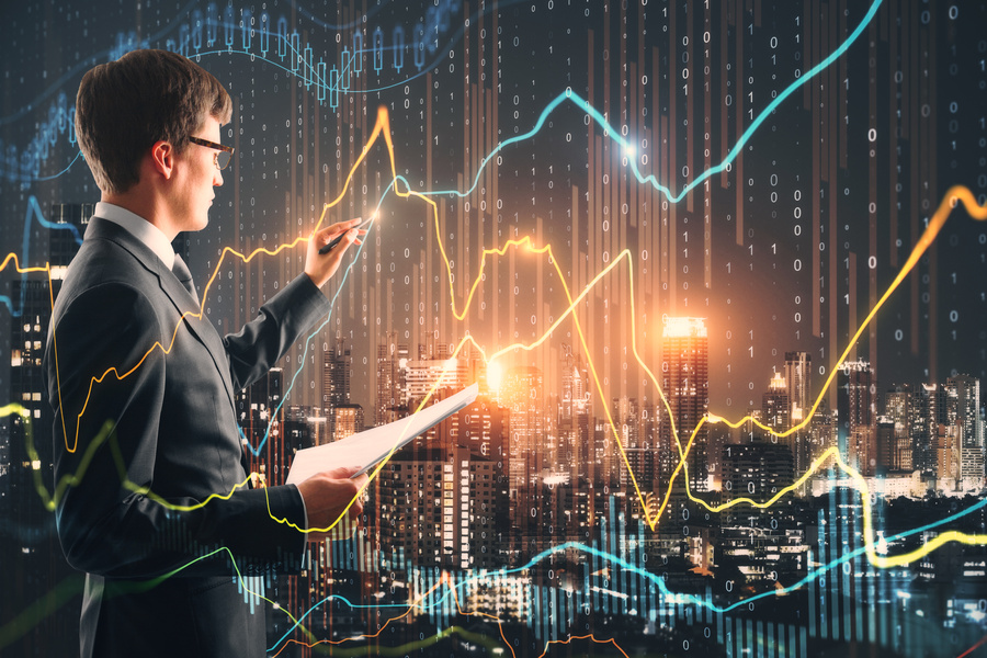 Handsome businessman with forex chart